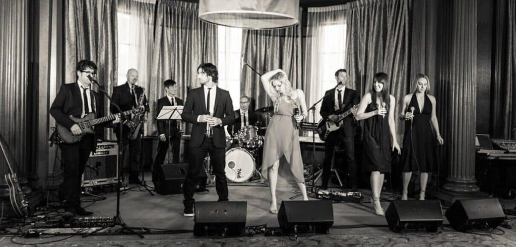 Side One band performing