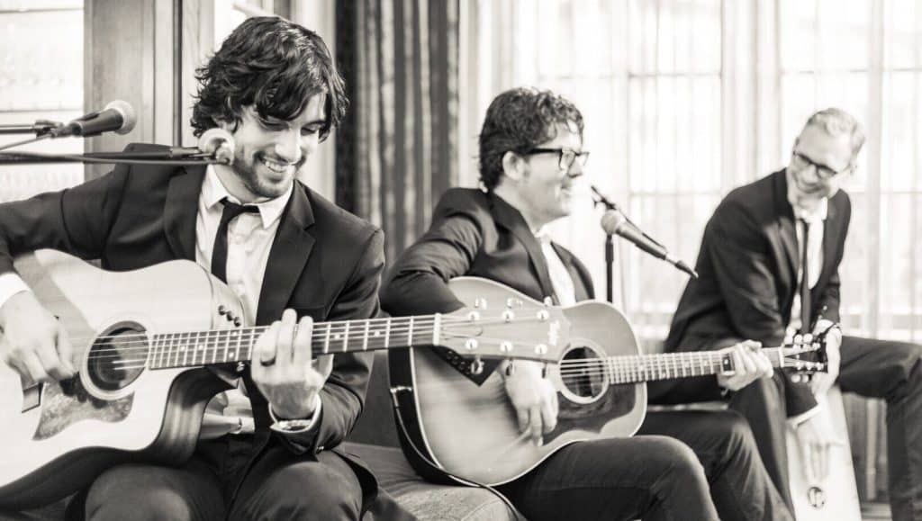 Side One acoustic band performing